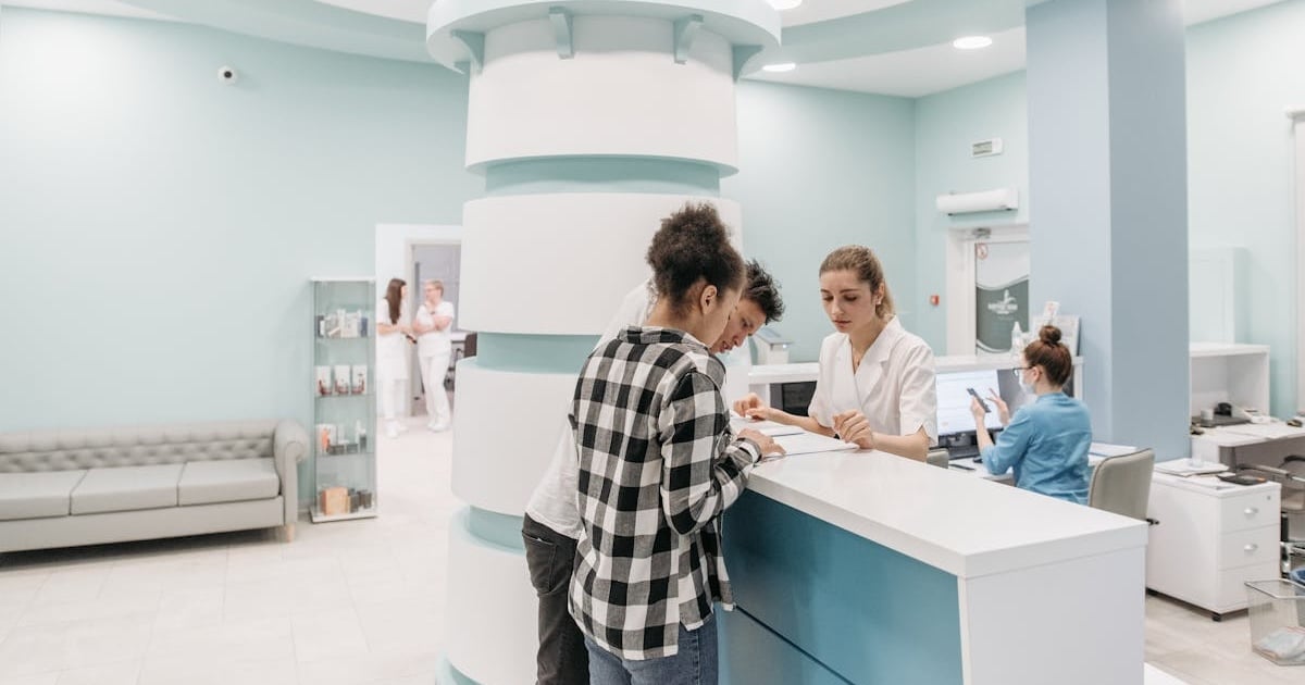 patient in a line to reception healthcare